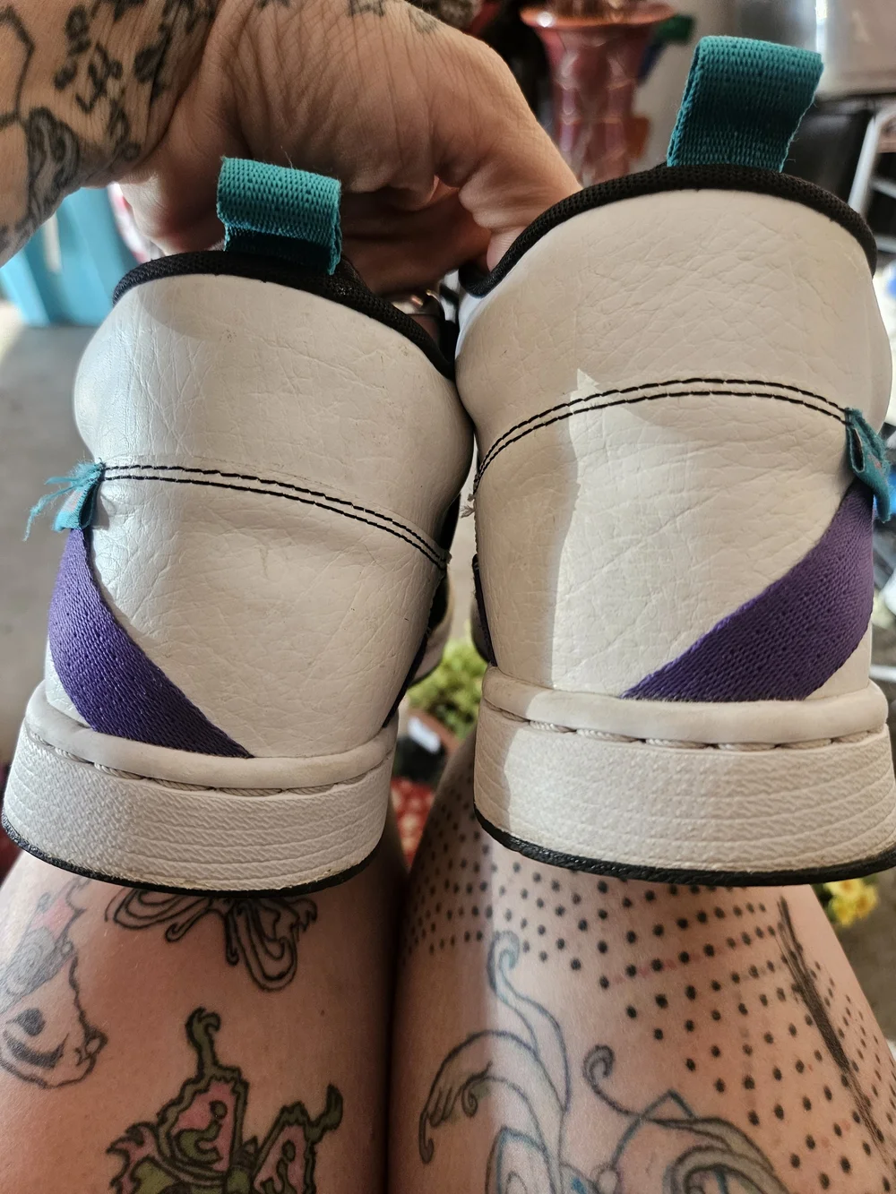 Jordan Black and White Mid-Top Sneakers with Teal & Purple Accent